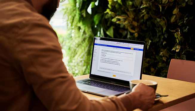 Man sitting with laptop